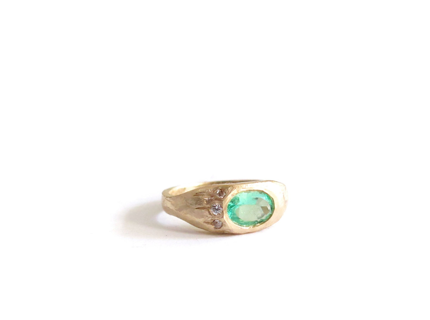 14K EMERALD + THREE DIAMOND RING