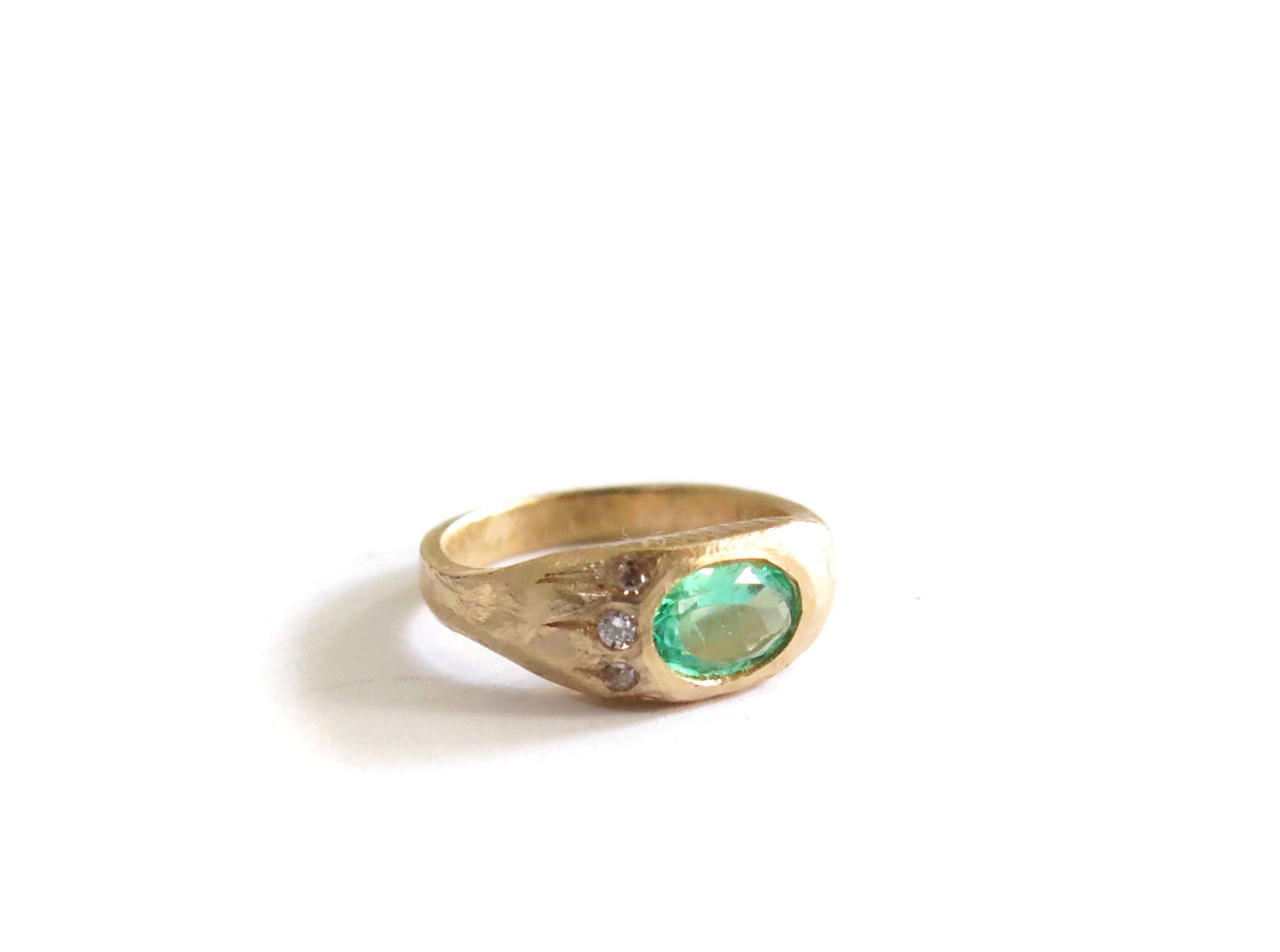 14K EMERALD + THREE DIAMOND RING