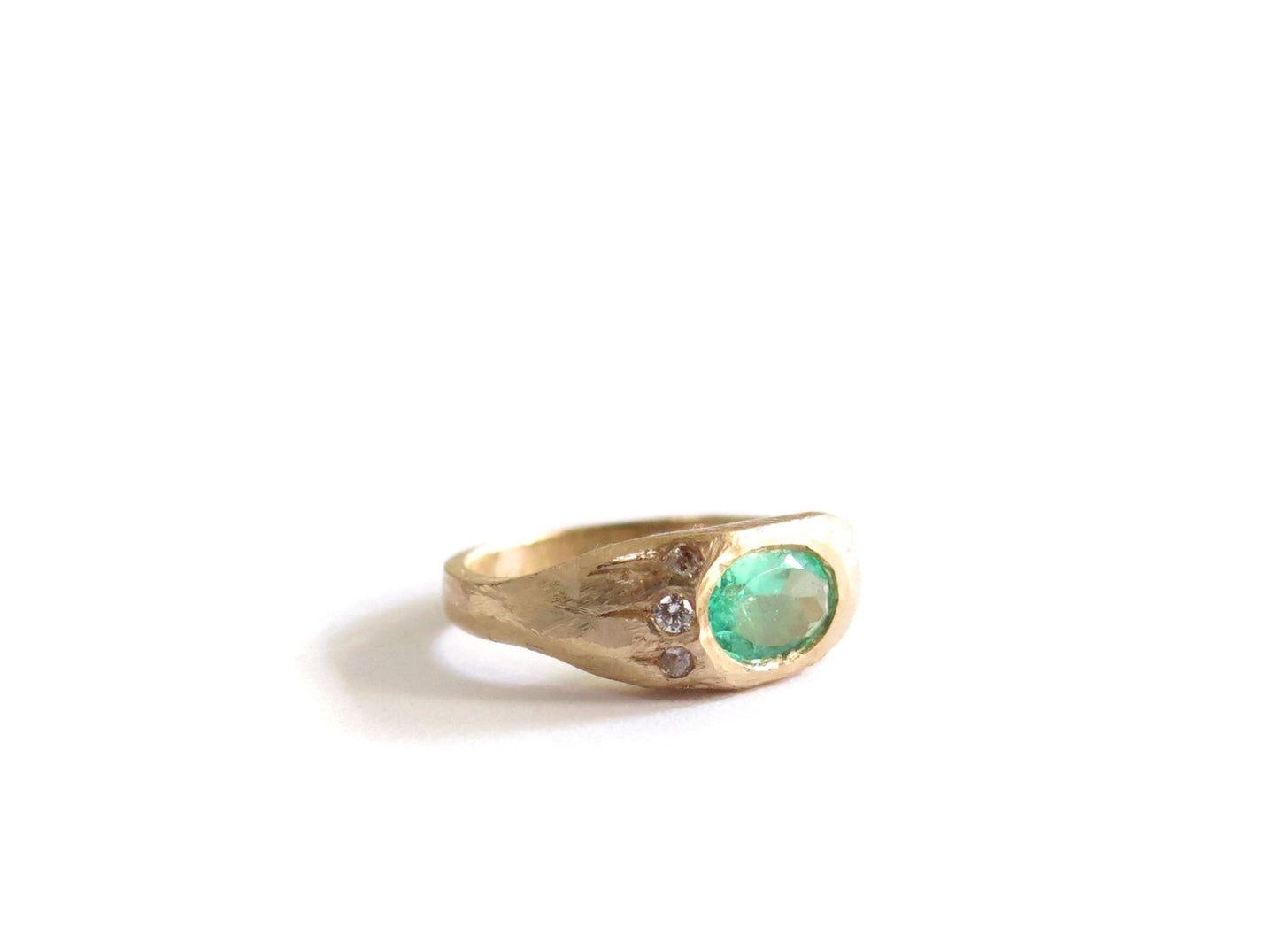 14K EMERALD + THREE DIAMOND RING