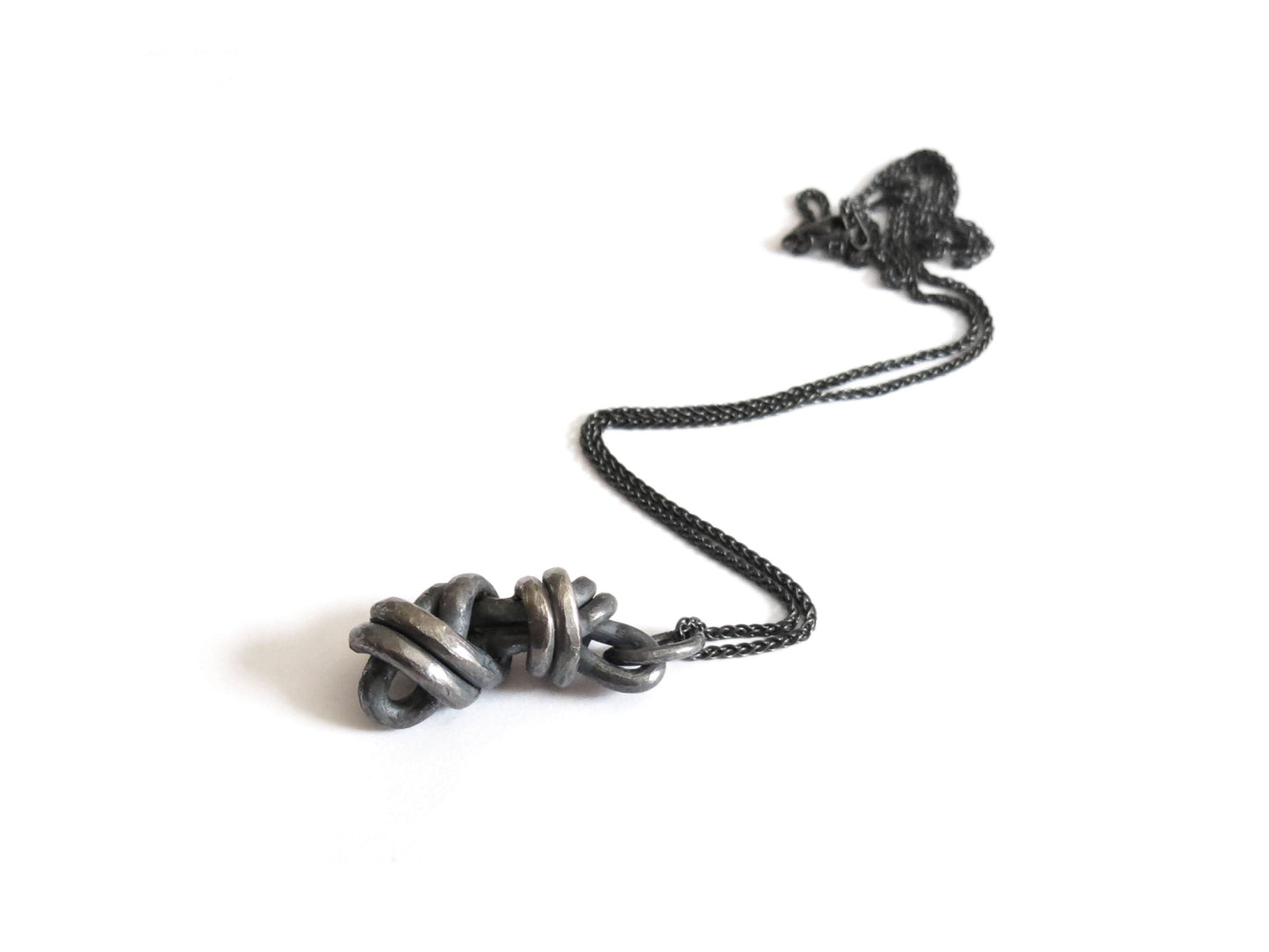 DOUBLE KNOT PENDANT