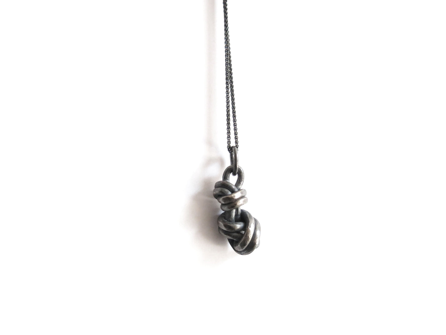 DOUBLE KNOT PENDANT
