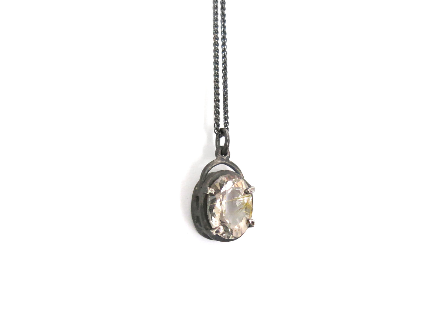 GOLDEN RUTILE FACETED OVAL