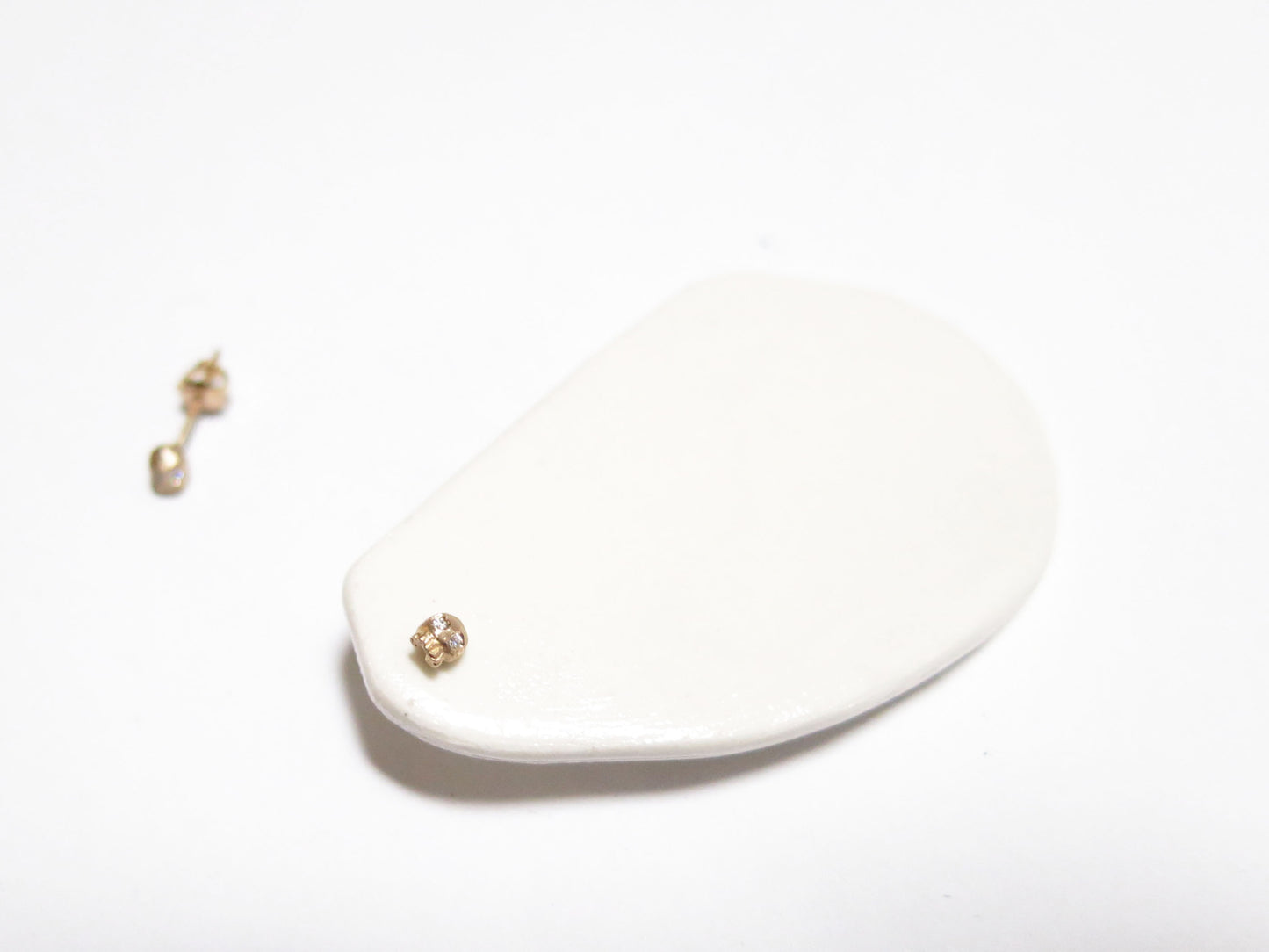 14K MICRO SKULL STUDS - DIAMOND EYES