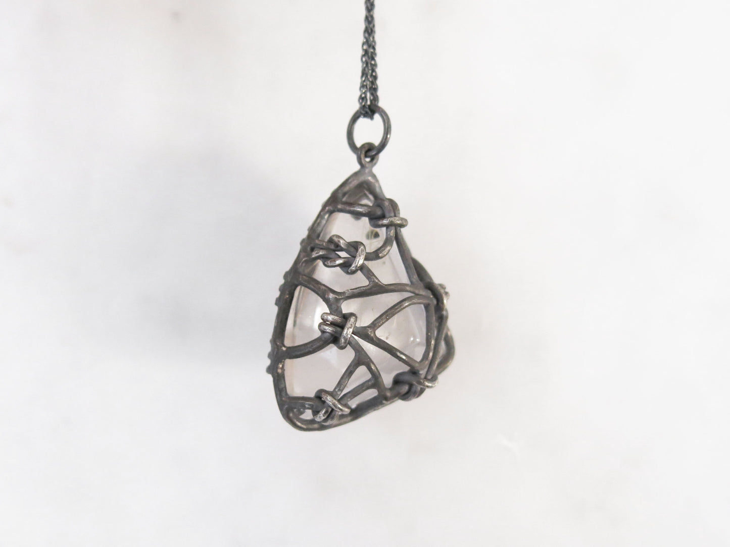 WEIRD TRIANGLE RUTILE QUARTZ NOEUDS